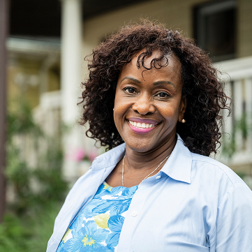 Smiling patient outdoors representing personalized heart care at Current Clinic